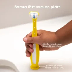 Frida Baby Trippelvinklad tandkramare